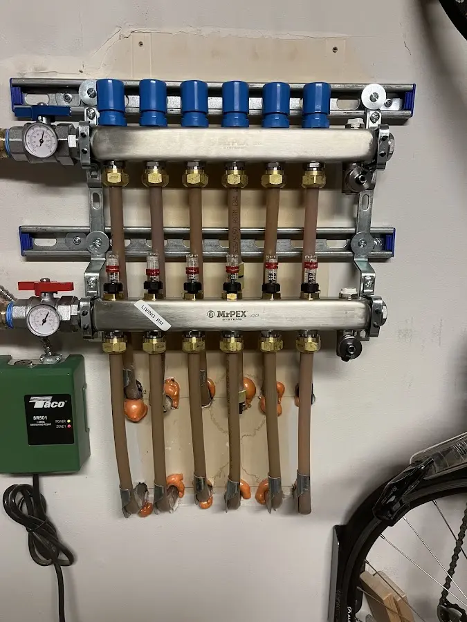 Plumber performing Water Heater Repair at a residential property in Douglas